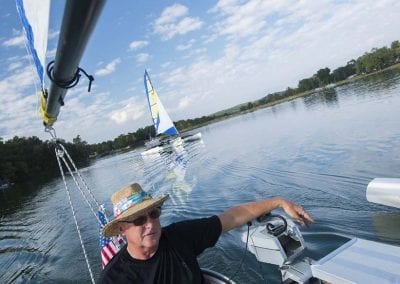 Man Saling on Lake